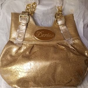 Purse-Brand new , never used. "Dereon" collection